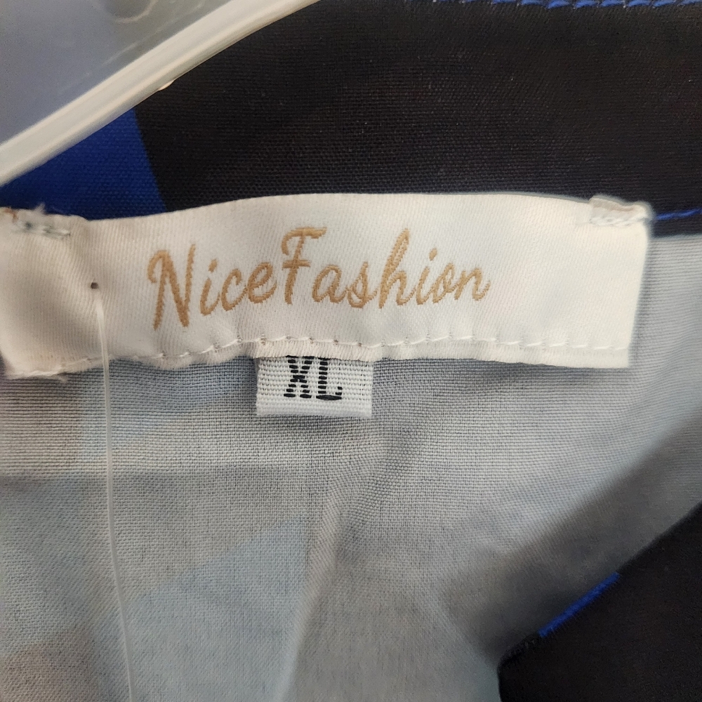 Nice Fashion blue and black jumpsuit. Patterns have circles and stripes. - Picture 10 of 10